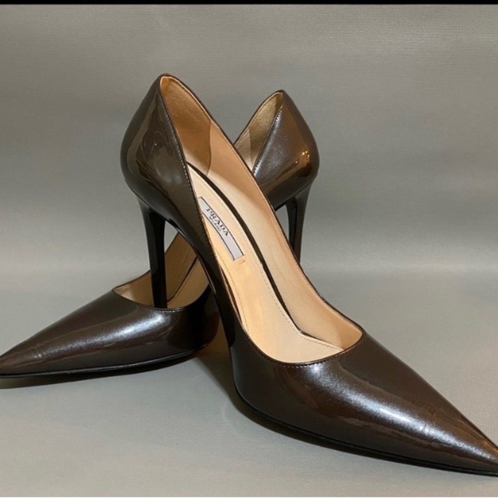 Prada brown metallic heels. Size 37.5 Little to no signs of wear. Dust bag